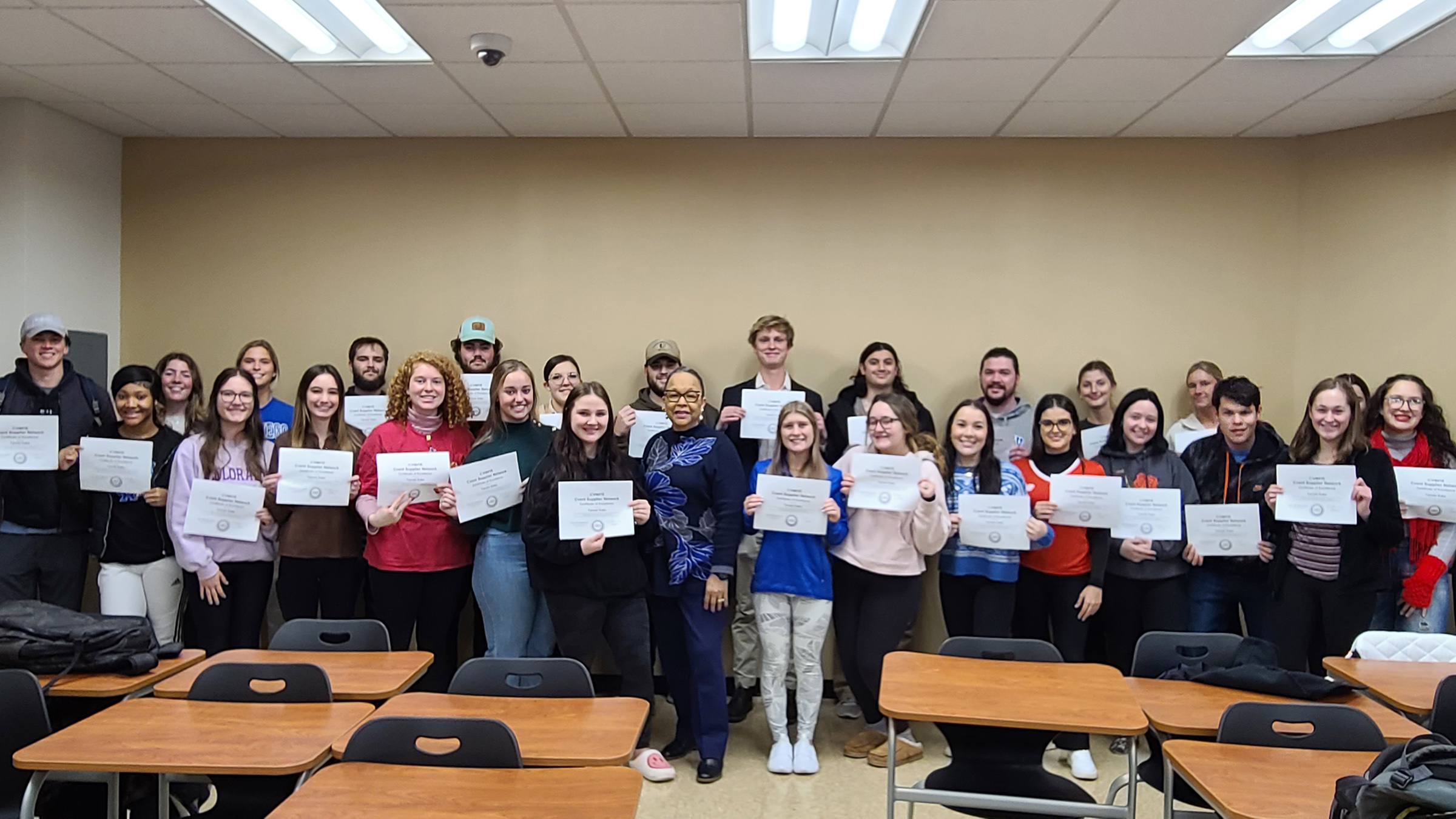 A group of students with their CVENT certificates