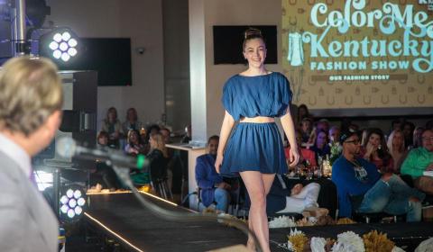 Students walks down the runway at the Color Me Kentucky spring fashion show